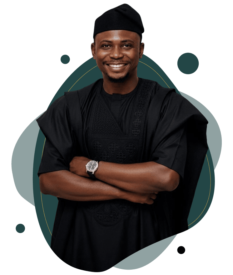 Kúnlé Ìlòrí-Diamond in a black agbada and cap, arms folded, smiling.
