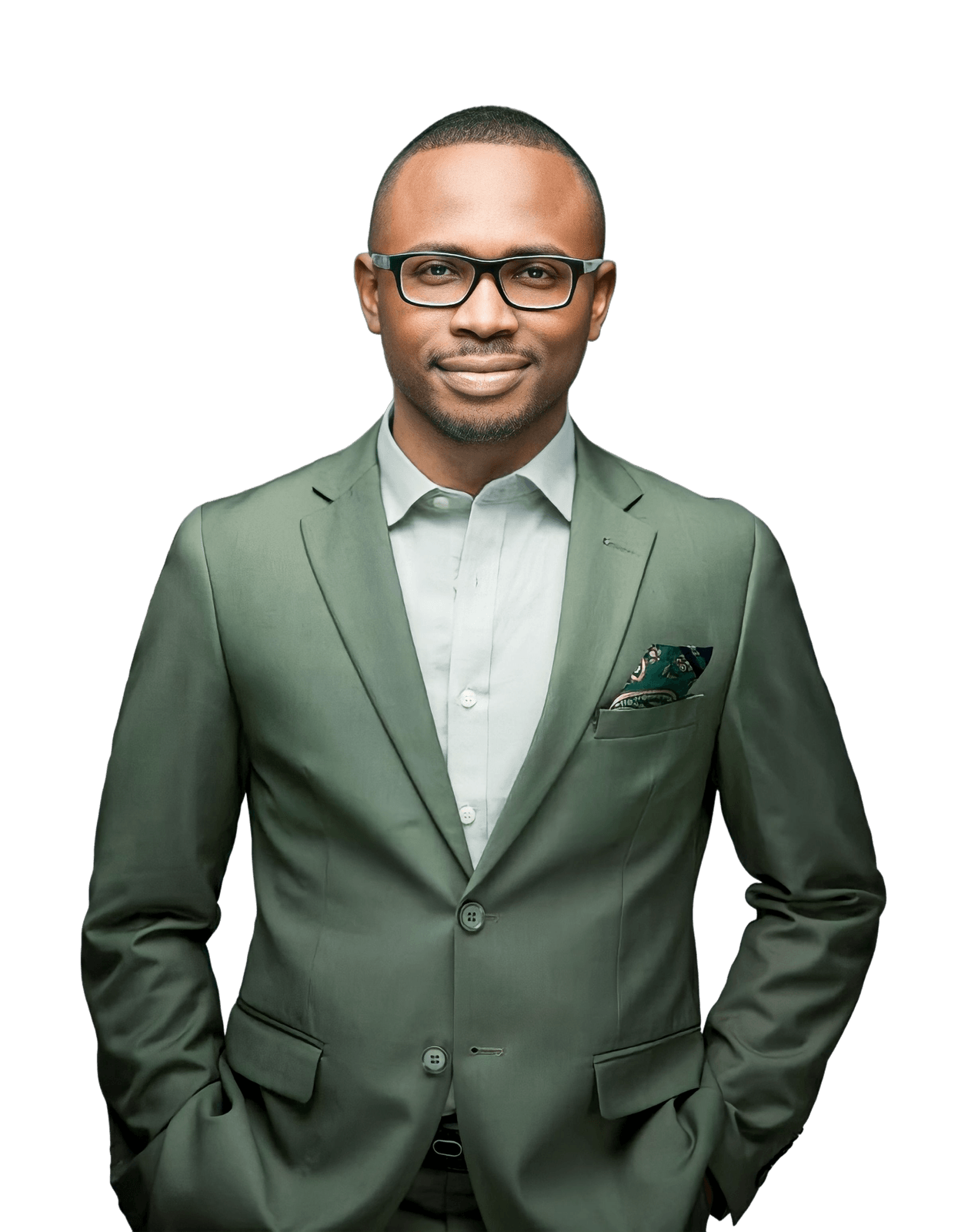 Kúnlé Ìlòrí-Diamond in a green suit and glasses, hands in pockets.